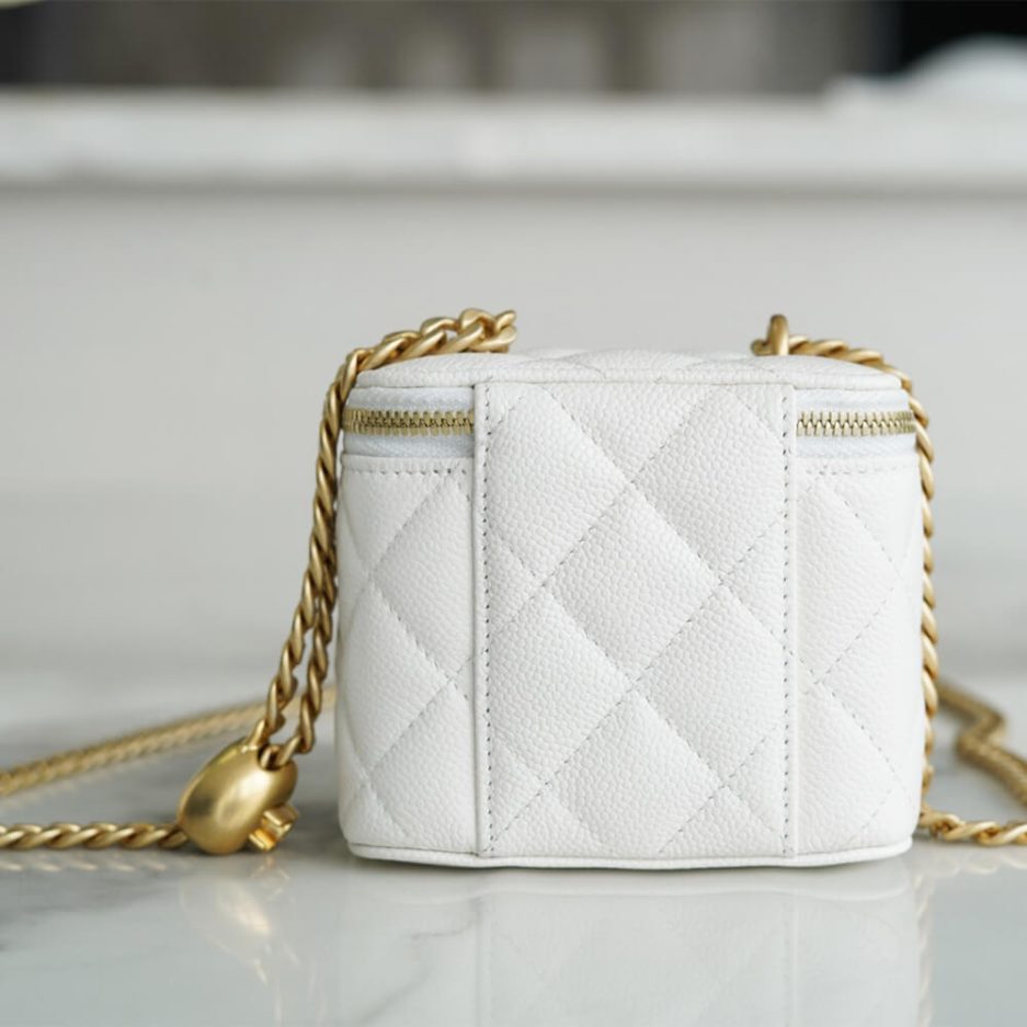 Ch**el small gold ball makeup bag