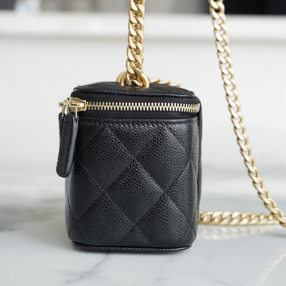 Ch**el small gold ball makeup bag