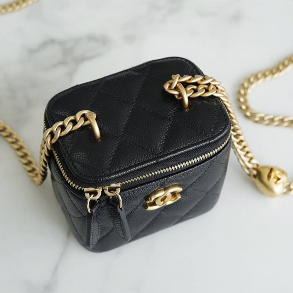 Ch**el small gold ball makeup bag