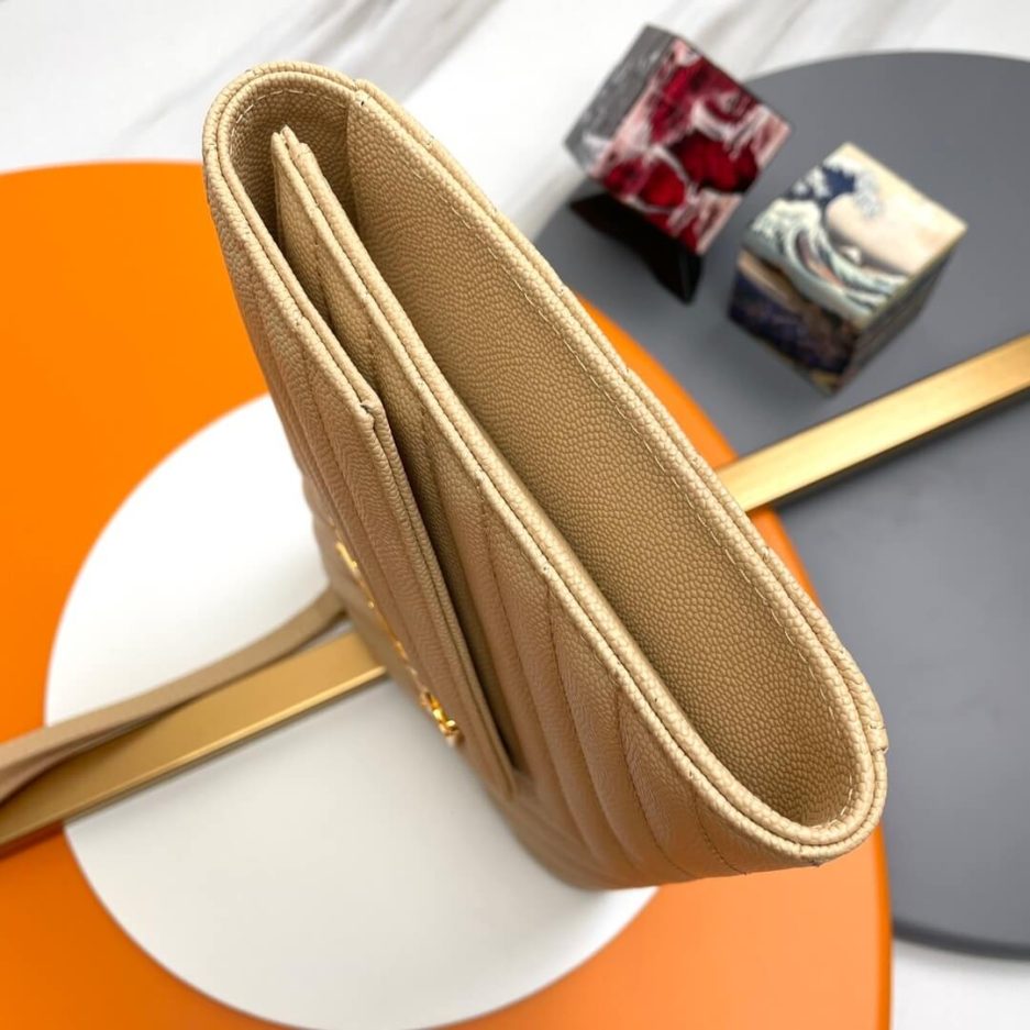 Y51 CASSANDRE matelassé leather flap clutch