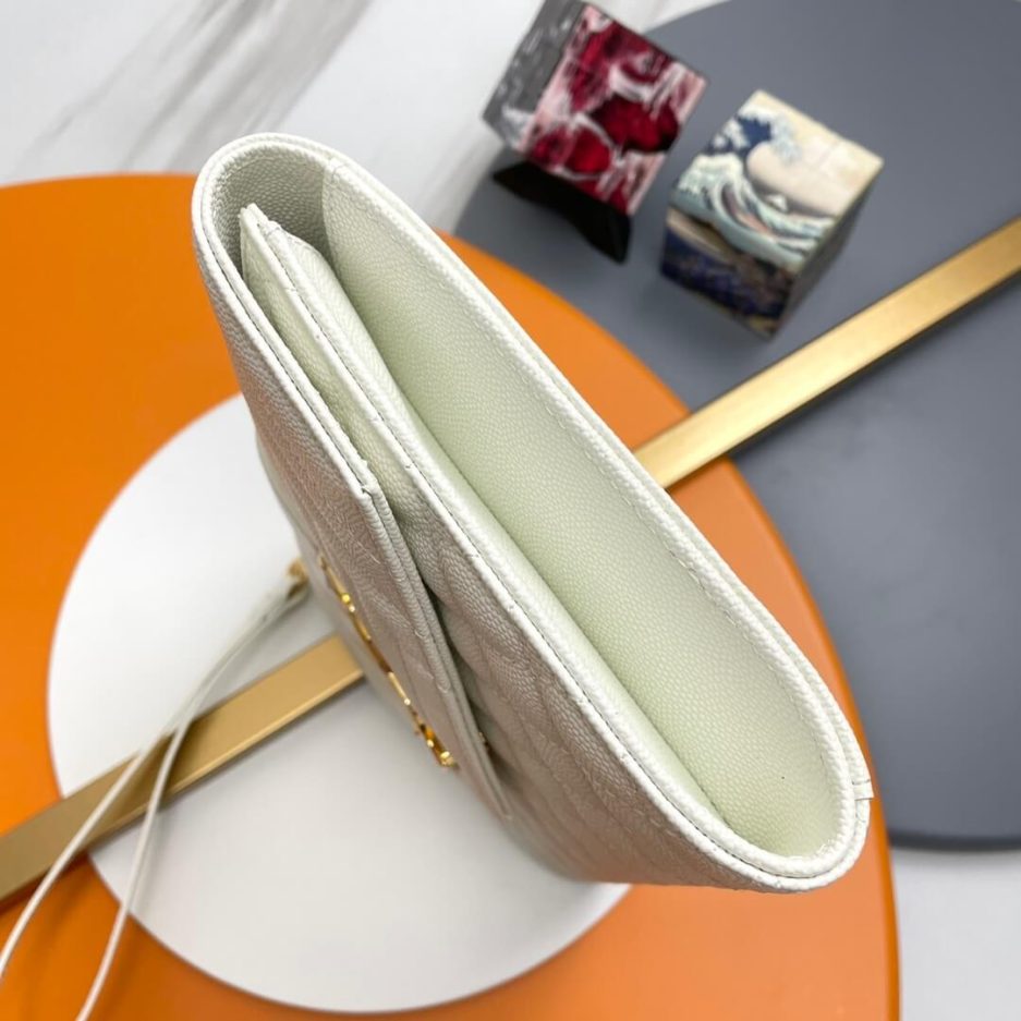 Y51 CASSANDRE matelassé leather flap clutch