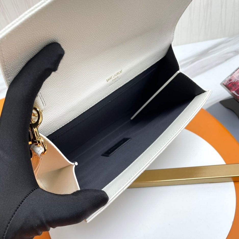 Y51 CASSANDRE matelassé leather flap clutch